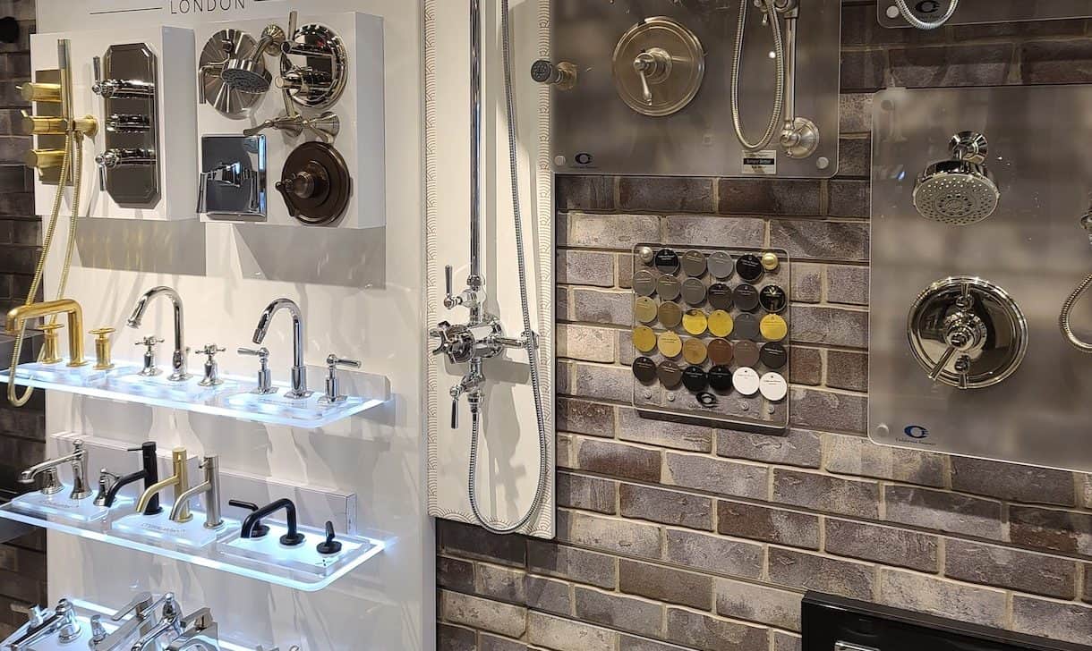 Showroom featuring a shower head display, along with faucets