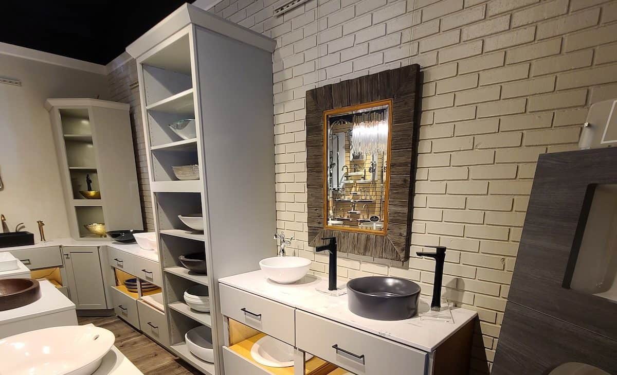 Showroom display featuring cabinet & hardware, with home decorations