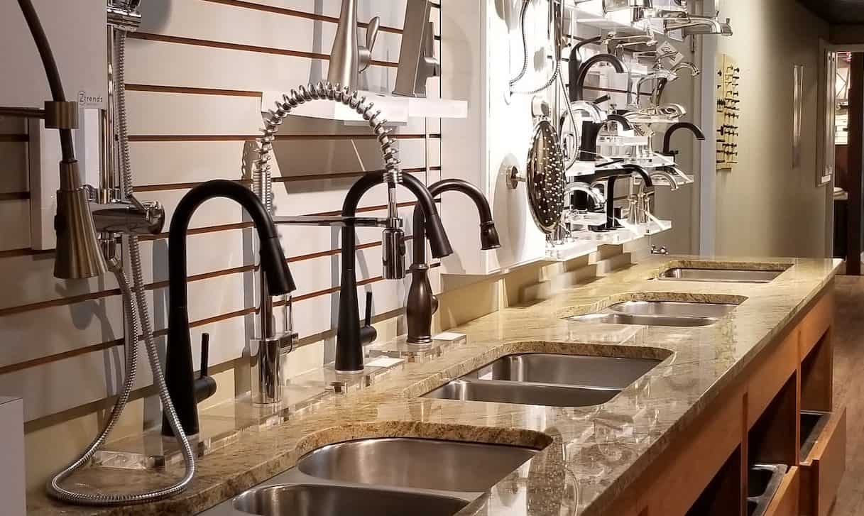Showroom display of faucets and sinks