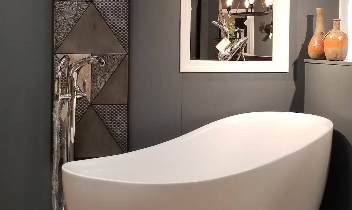 Showroom display of bathtub with home decorations