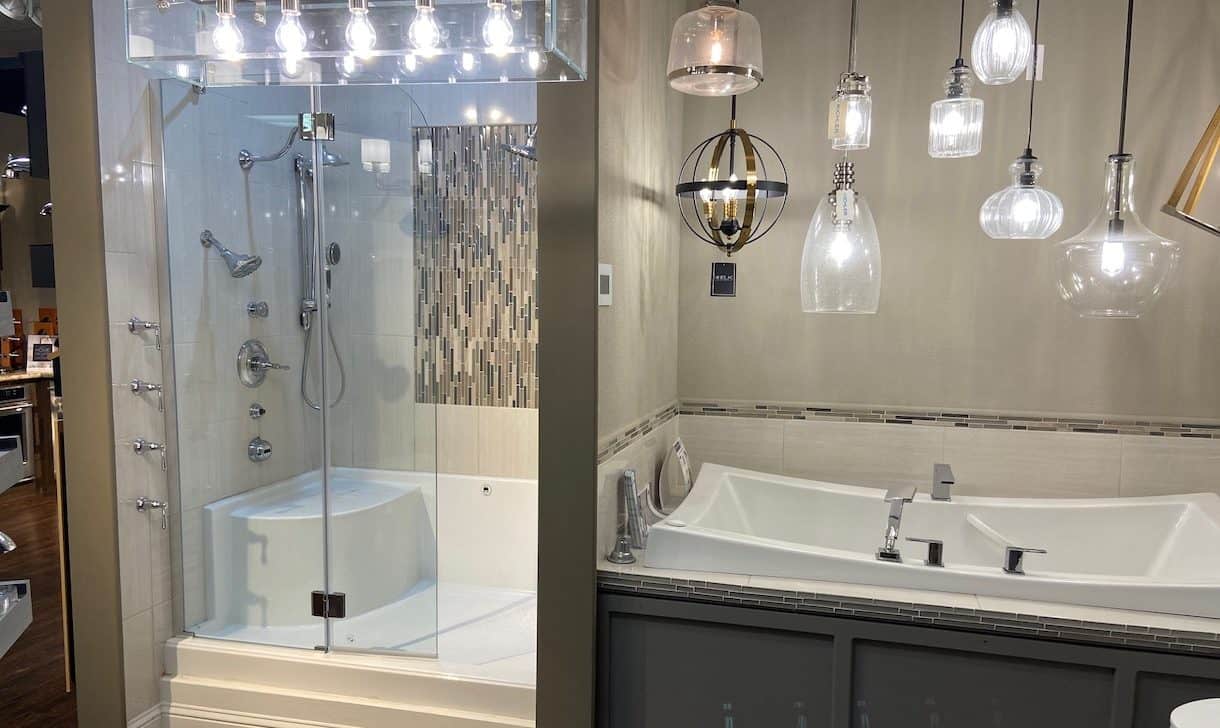 Showroom display featuring Shower, tub, and lights