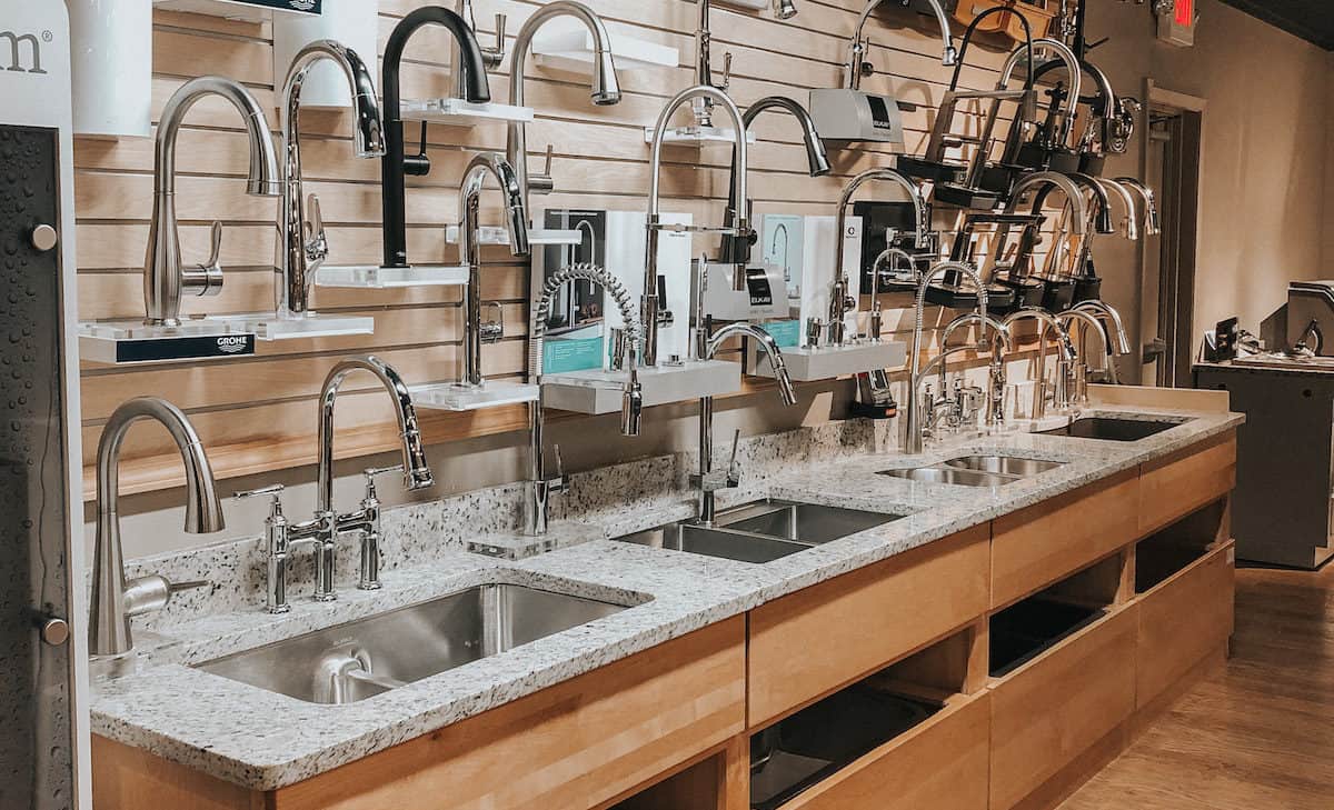 Display featuring sinks and faucets, with countertops