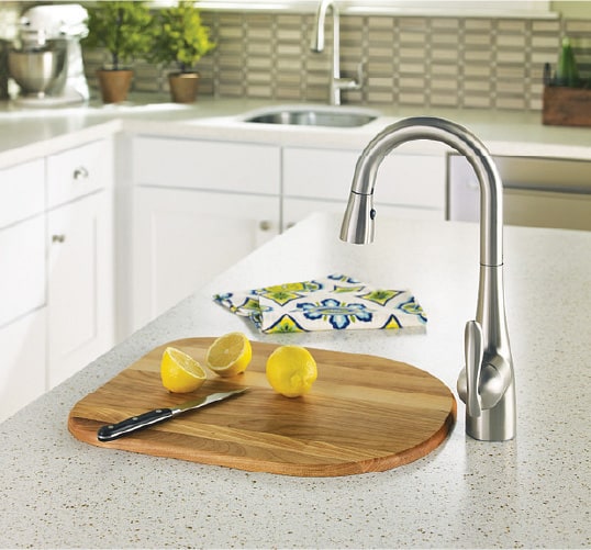 An over the sink cutting board is the perfect kitchen upgrade idea for those looking to save space.