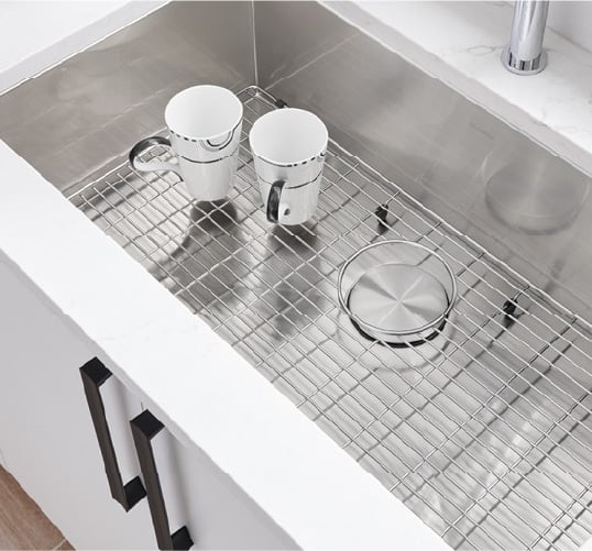 A Kitchen sink grate to house cups and other small dishes. Get more kitchen upgrade ideas at Coburn's Kitchen & Bath Showroom.