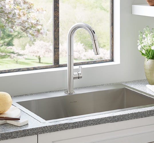 The versatility of this sleek stainless steel faucet makes it the perfect kitchen design inspiration for any style.