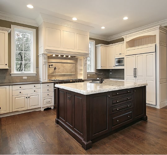 Recessed kitchen lighting in a traditional-style kitchen. Get more kitchen upgrade ideas at Coburn's Kitchen & Bath Showroom.