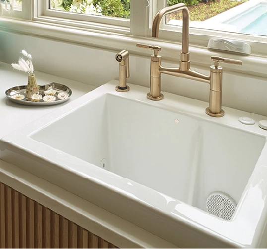 A simple, yet elegant laundry room sink perfect for a luxury laundry room design on a budget.